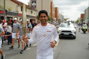 PARIS 2024 - Olympic Torch flame bearer Nasser Al-Khelaifi in Vigneux-sur-Seine