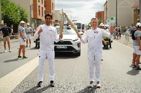 PARIS 2024 - Olympic Torch flame bearer Nasser Al-Khelaifi in Vigneux-sur-Seine