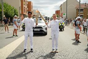 PARIS 2024 - Olympic Torch flame bearer Nasser Al-Khelaifi in Vigneux-sur-Seine