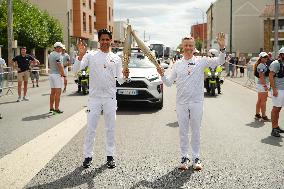 PARIS 2024 - Olympic Torch flame bearer Nasser Al-Khelaifi in Vigneux-sur-Seine