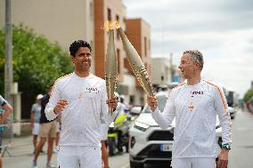 PARIS 2024 - Olympic Torch flame bearer Nasser Al-Khelaifi in Vigneux-sur-Seine