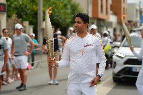 PARIS 2024 - Olympic Torch flame bearer Nasser Al-Khelaifi in Vigneux-sur-Seine