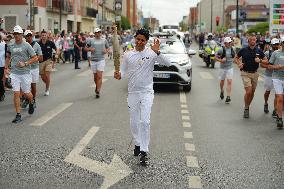 PARIS 2024 - Olympic Torch flame bearer Nasser Al-Khelaifi in Vigneux-sur-Seine