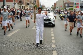 PARIS 2024 - Olympic Torch flame bearer Nasser Al-Khelaifi in Vigneux-sur-Seine