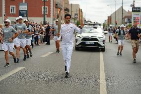 PARIS 2024 - Olympic Torch flame bearer Nasser Al-Khelaifi in Vigneux-sur-Seine