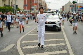 PARIS 2024 - Olympic Torch flame bearer Nasser Al-Khelaifi in Vigneux-sur-Seine