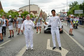 PARIS 2024 - Olympic Torch flame bearer Nasser Al-Khelaifi in Vigneux-sur-Seine