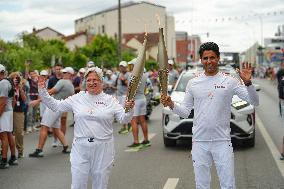 PARIS 2024 - Olympic Torch flame bearer Nasser Al-Khelaifi in Vigneux-sur-Seine