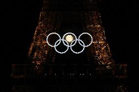 Paris 2024 - Full Moon Rises Behind Olympic Rings