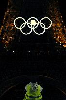 Paris 2024 - Full Moon Rises Behind Olympic Rings