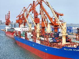 Ships Load Cargo at Yantai Port