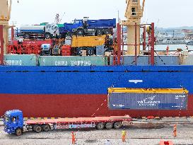 Ships Load Cargo at Yantai Port