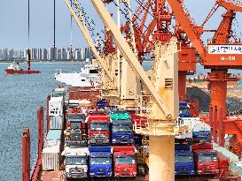 Ships Load Cargo at Yantai Port