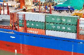 Ships Load Cargo at Yantai Port