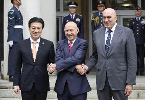 Japan, Britain, Italy defense chiefs hold talks