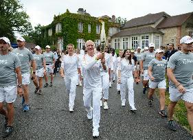 Olympic Torch flame bearer Didier Deschamps in Clairefontaine-en-Yvelines