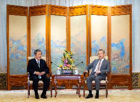 CHINA-BEIJING-WANG YI-HIROSHI MORIYAMA-MEETING (CN)