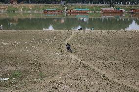 Heatwave Dries Up Kashmir's River Jhelum