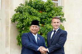 French President Emmanuel Macron Is Welcoming Indonesia's Defence Minister And President-elect Prabowo Subianto