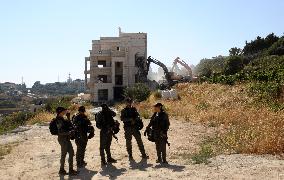 MIDEAST-HEBRON-HOUSE-DEMOLITION