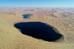 Badain Jaran Desert sand Mountain Lake Group Inscribed on World Heritage List