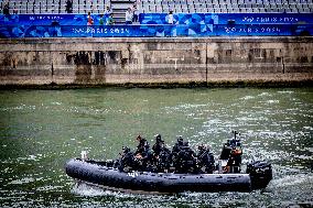 Paris 2024 - Police Patrol On River La Seine