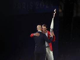 Paris 2024 - Zinedine Zidane And Rafael Nadal Carrie The Flame