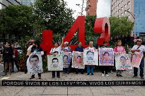 Mothers, Fathers And Relatives Of The 43 Students From Ayotzinapa March Almost 10 Years After Their Forced Disappearance