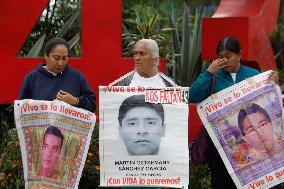 Mothers, Fathers And Relatives Of The 43 Students From Ayotzinapa March Almost 10 Years After Their Forced Disappearance