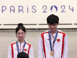 Paris 2024 - Lihao Sheng And Yuting Huang Win 10M Air Rifle Mixed Team Gold Medal