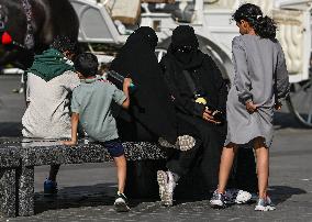 Crowd Of Middle Eastern Tourists In UNESCO Krakow