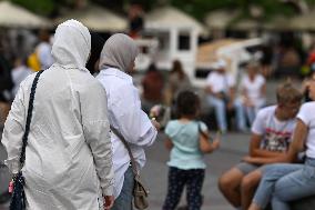 Crowd Of Middle Eastern Tourists In UNESCO Krakow