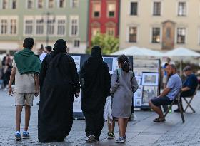 Crowd Of Middle Eastern Tourists In UNESCO Krakow