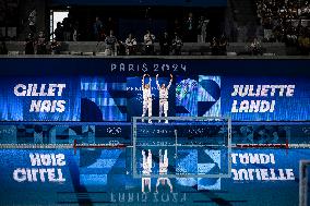 Paris 2024 - Juliette Landi And Nais Gillet At Women's Synchronised 3m Springboard Diving Final