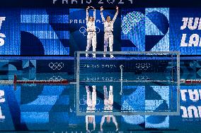 Paris 2024 - Juliette Landi And Nais Gillet At Women's Synchronised 3m Springboard Diving Final