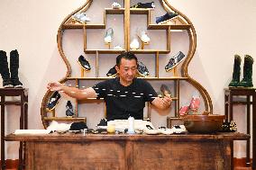 CHINA-BEIJING-CENTRAL AXIS-UNESCO WORLD HERITAGE-TIME-HONORED SHOE MAKER (CN)