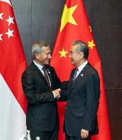 LAOS-VIENTIANE-WANG YI-SINGAPOREAN FM-MEETING