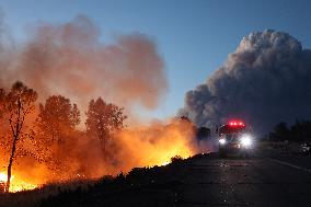 Fires Rage Across US West