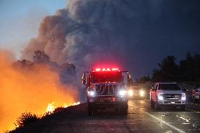 Fires Rage Across US West