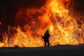 Fires Rage Across US West