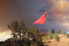 Fires Rage Across US West