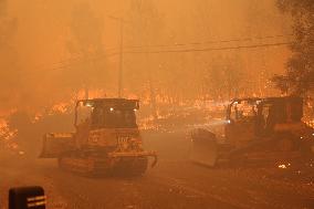 Fires Rage Across US West