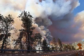 Fires Rage Across US West