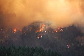 Fires Rage Across US West