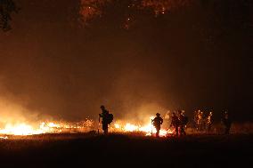 Fires Rage Across US West