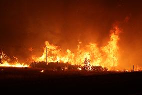 Fires Rage Across US West