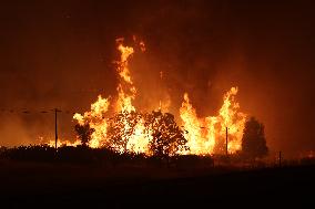 Fires Rage Across US West