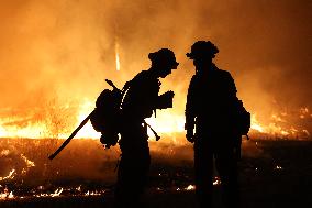 Fires Rage Across US West