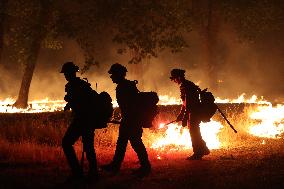 Fires Rage Across US West