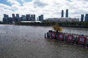 Swimmers Swim Across The Qiantang River in Hangzhou